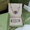 Gucci GG Floral Cross Charm Silver Chain Bracelet