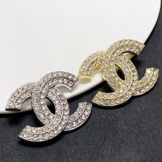CHANEL Radiant CC Signature Brooch