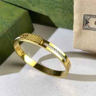 Gucci Textured GG Pattern Crystal Accent Slim Cuff Bracelet